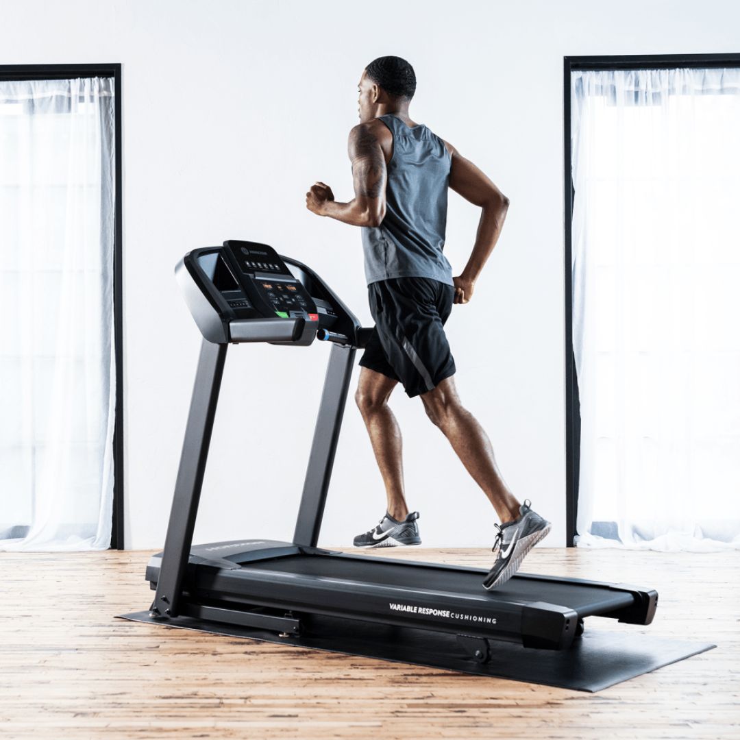 man running on a horizon t101 treadmill availabel from The Gym And Treadmill Surgeon